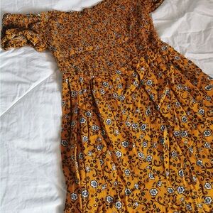 Magnolia Floral Smocked jumpsuit in Mustard